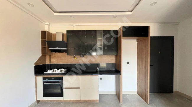 A fantastic 1+1 apartment with luxurious design and elevator in  ÖREN from GÜMÜŞ