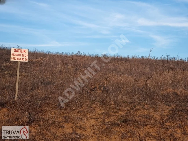 A plot of land measuring 2205m2 with a frontage on the main street at the entrance of Yeni Aktaş neighborhood in Balıkesir Sındırgı.