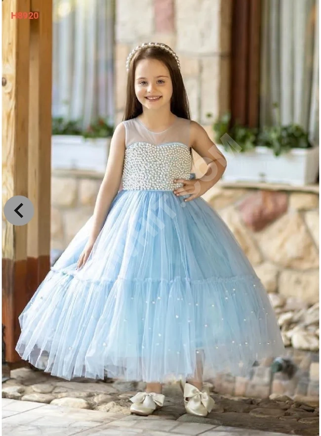 Girls' tulle dress adorned with pearls