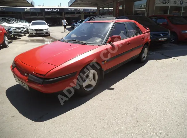 1991 MAZDA 323