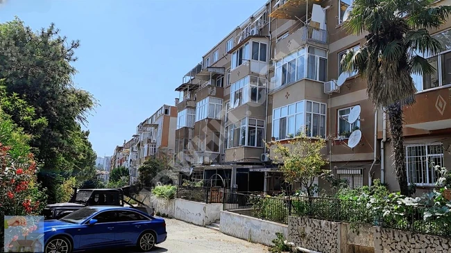 Apartment in İnan Blokları on the top floor with a terrace and parking, with a land share of 67 square meters from Dinçer Dinç.