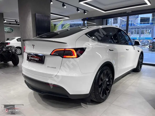 TESLA MODEL Y PERFORMANS CARBON - بعداد 12.000 كم , بدون عيوب - من Q MOTORS