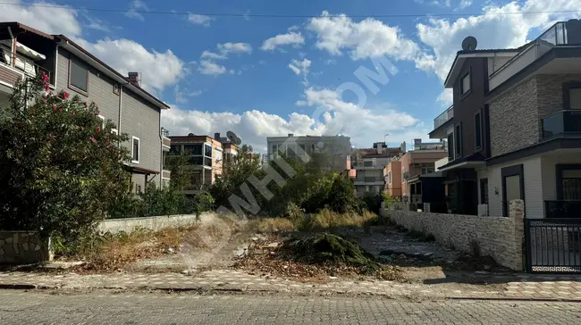 Opportunity: Independent plot of land near the market and coast, located in the center of the AKÇAY area.