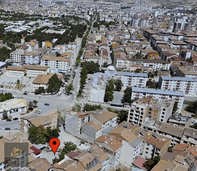 Residential and commercial land for sale with an area of 1024 m², located in the center of İCADİYE.