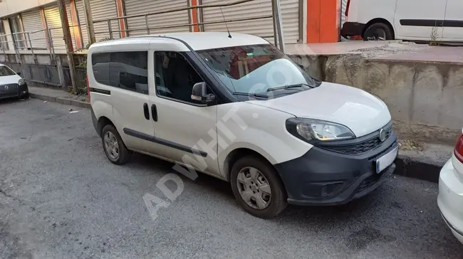 2018 -  FIAT DOBLO 1.3 - باب خلفي زجاجي - مقاعد خلفية - مسافة 294000 كم