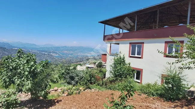 A vineyard and a house with five acres overlooking the dam in SARIÇUKUR - from MARAŞ EMLAK.