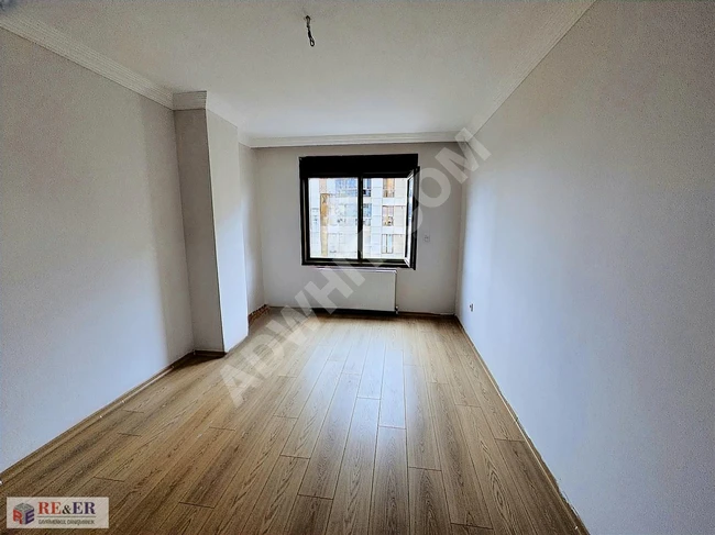 A new 3+1 apartment with a sea view opposite SGK in Kaynarca with a residence permit.