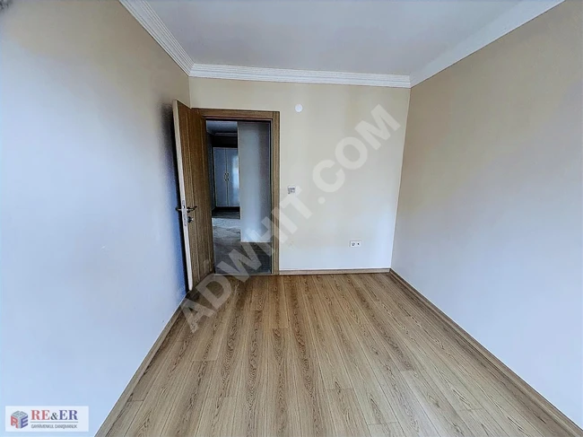 A new 3+1 apartment with a sea view opposite SGK in Kaynarca with a residence permit.