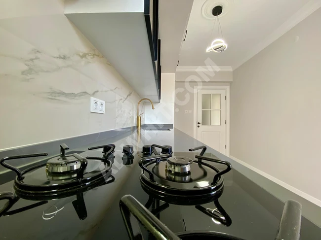 A wonderful 3+1 apartment with a Turkish bath design and a separate kitchen by Gümüş.