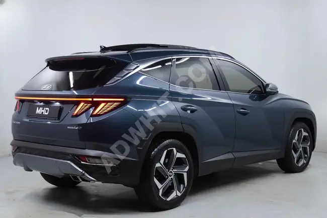 2021 - Hyundai TUCSON 1.6CRDİ ELİTE PLUS - سقف زجاجي - مقاعد تبريد و تدفئة -  دفع رباعي - من MHD