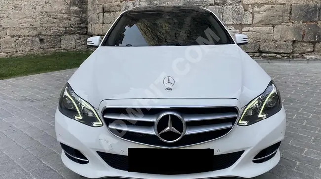 MERCEDES E180 ELİTE - بسقف زجاجي , مصابيح LED , مقاعد مدفأة , اكمل حزمة , بدون حوادث