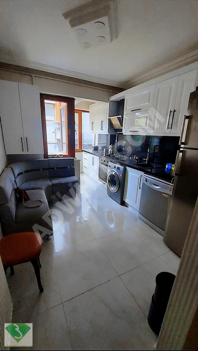 3+1 apartment with a space of 130m², clean, with open parking and an elevator.