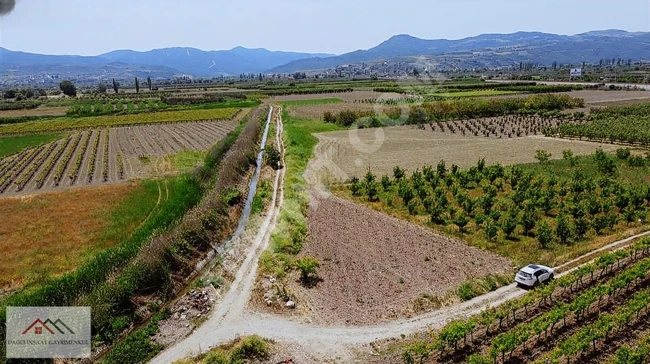 A corner plot very close to the village. There is a unique formal road and a water channel.