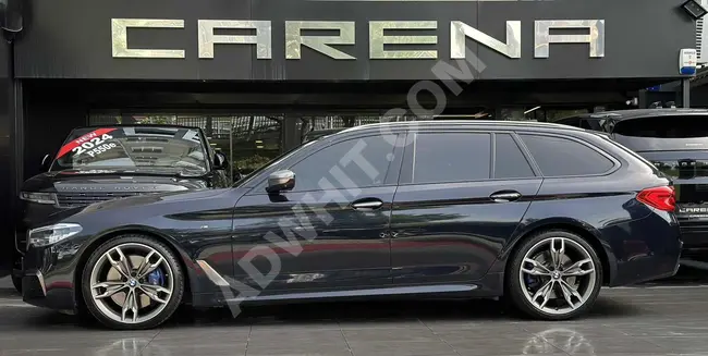 BMW 550d xDrive M SPORT Touring CARBON موديل 2018 بعداد 105.000 كم -CARENA