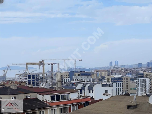 A spacious duplex apartment with a sea view in the GÜZELYALI area by DAĞCI.