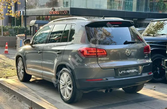 VOLKSWAGEN TIGUAN 1.4 TSI CUP - سقف زجاجي - بدون عيوب - من UNIVERSAL AUTO