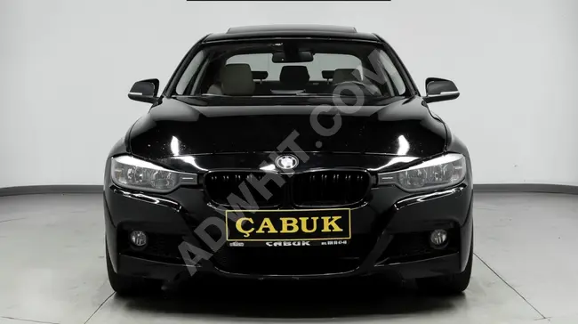 2013 - BMW 320d M - قتحة سقف - خارجي لون أسود و تنجيد داخلي لون بيج - صيانة كاملة