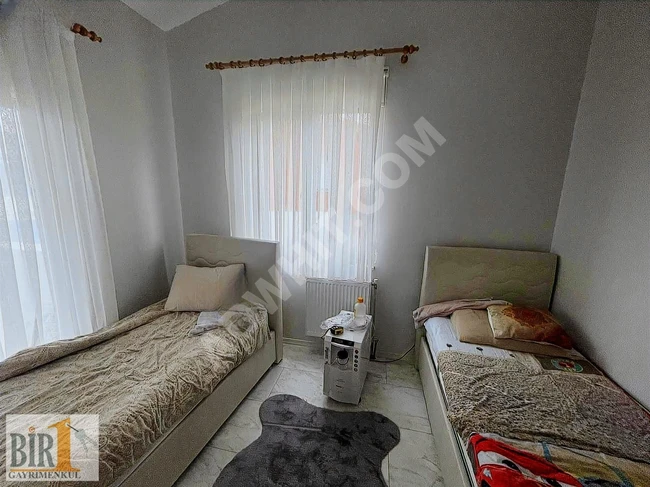 1+1 furnished apartment with sauna and pool, suitable for loans from BİR GAYRİMENKUL