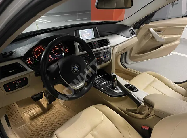 2014 - BMW 3.20 İED - فتحة سقف - مسافة 140.000 كم - تنجيد بيج - بدون عيوب وب دون طلاء