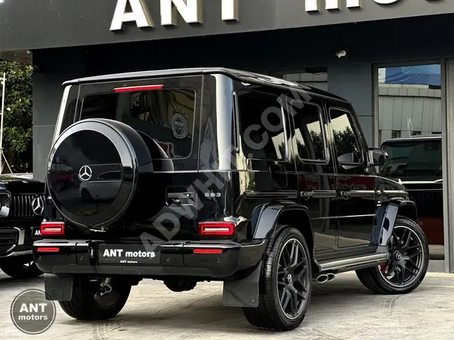 2023 - MERCEDES G63 AMG KARBON - مقاعد تبريد - نظام صوتي BURMESTER - داخلي لون احمر