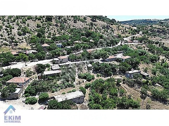 A plot of land measuring 641 square meters with urban planning in the village of TAŞBOĞAZ, belonging to AYVACIK.