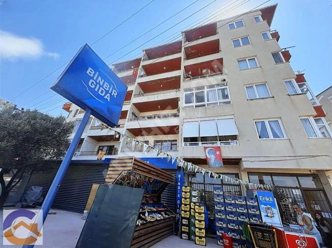 A renovated 2+1 apartment with a sea view in ÇINARCIK KORU