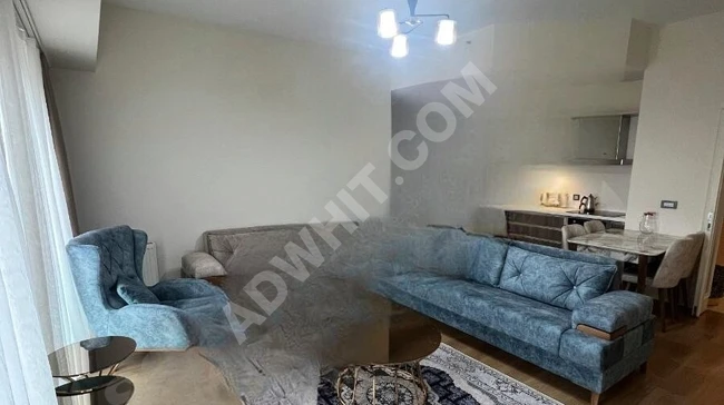 A fully furnished 2+1 apartment for rent in the VİAPORT VENEZİA complex.