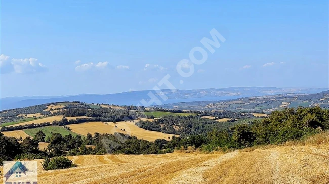 Land for sale in KEMEL with a view of the strait and the bridge.