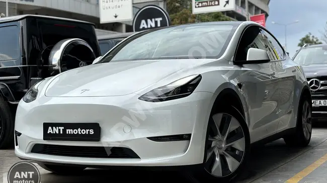 TESLA MODEL Y موديل 2023 مدى طويل + دفع رباعي + مساعد قيادة الي + سقف زجاجي + متكاملة بدون عيوب