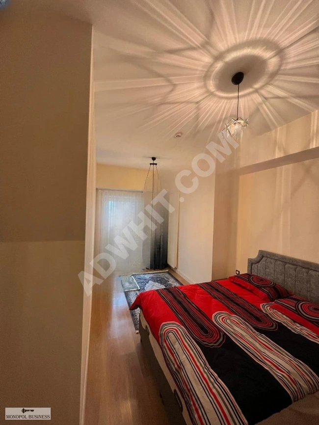 A fully furnished 2+1 apartment for rent in the VİAPORT VENEZİA complex.