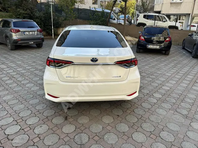 2021 - TOYOTA COROLLA DREAM HYBRİD - بناقل حركة اوتوماتيكية - عداد أصلي مسافة 113000 كم