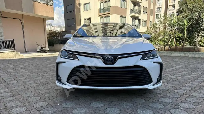 2021 - TOYOTA COROLLA DREAM HYBRİD - بناقل حركة اوتوماتيكية - عداد أصلي مسافة 113000 كم