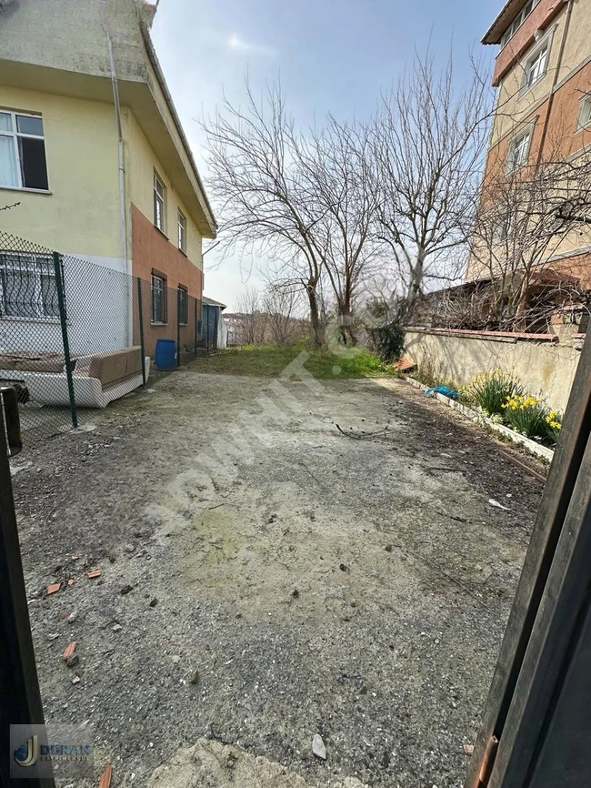 A plot of land measuring 310 square meters is located on Çavuşbaşı Street. The land is near the IETT bus station.