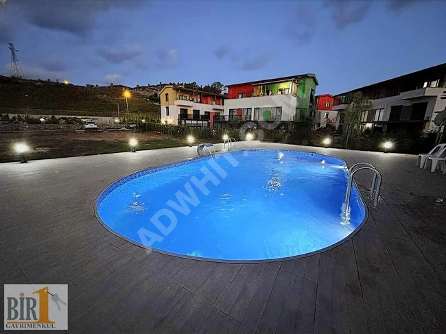 1+1 furnished apartment with sauna and pool, suitable for loans from BİR GAYRİMENKUL