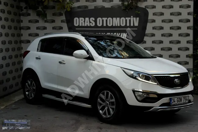 SPORTAGE CONCEPT PLUS موديل 2014 - سقف بانورامي - 82.000 كم - من ORAS