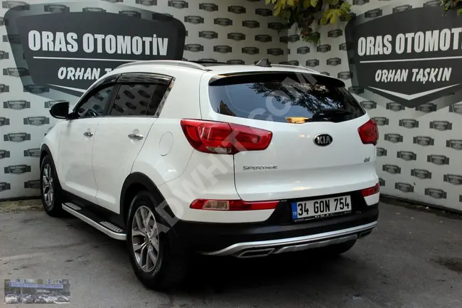 SPORTAGE CONCEPT PLUS موديل 2014 - سقف بانورامي - 82.000 كم - من ORAS