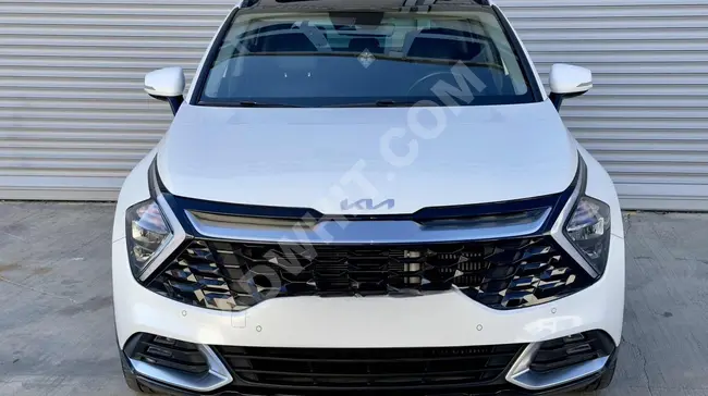 KİA SPORTAGE  1.6 CRDI HYBRİD  ELAGANCE KONFOR 2022 - بدون عيوب - من DEHA OTOMOTİV