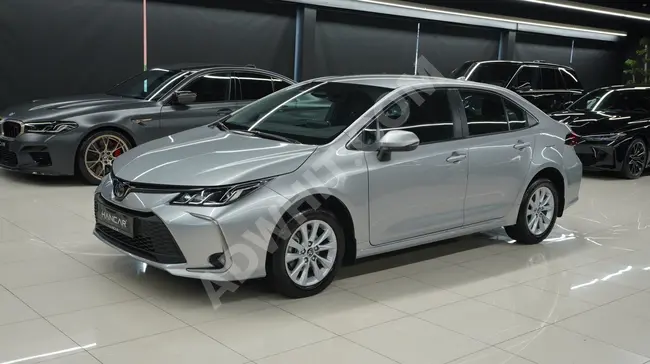 TOYOTA COROLLA 1.8 HYBRID DREAM E-CVT Model 2024 -HANCAR