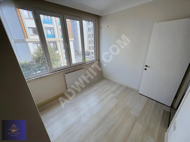 An apartment in a new building, with a southern facade and an equipped kitchen, only 200 meters away from the E-5 road - from ORKA