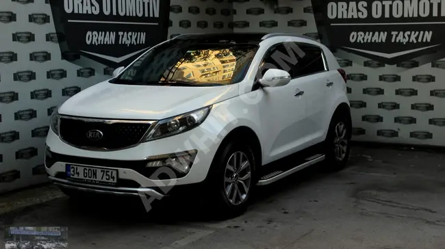 SPORTAGE CONCEPT PLUS موديل 2014 - سقف بانورامي - 82.000 كم - من ORAS