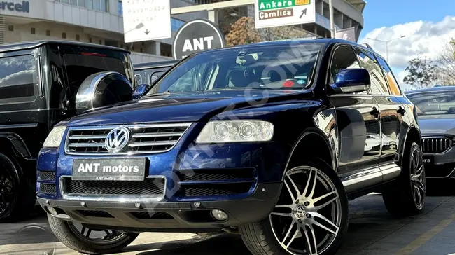 سيارة VW TOUAREG 5.0 TDI V10 موديل 2005+ نظام AIRMATIC +سقف بانورامي +تدفئة