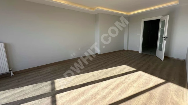 Spacious 3+1 apartment with balcony, elevator, and parking for sale in SULTANTEPE.