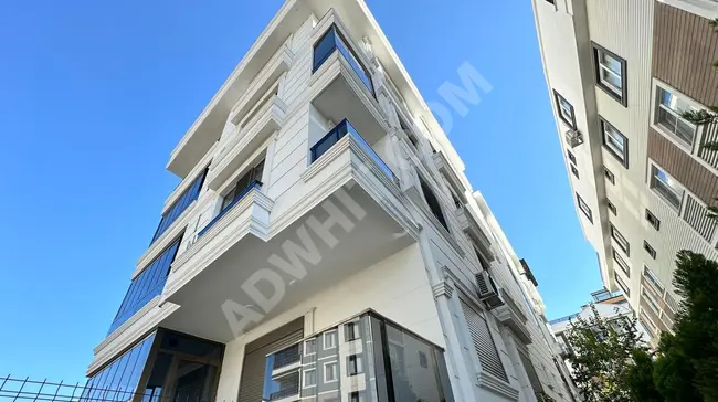 New 1+1 apartment for sale, with a natural gas system, in Altınkum.