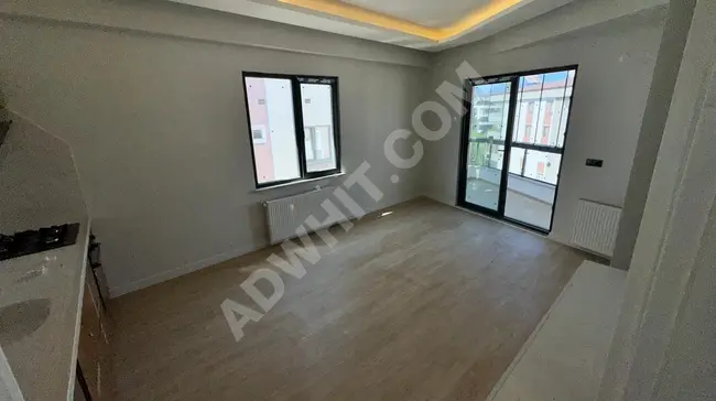 2+1 new apartment, with a front facade, equipped with a natural gas system, in Altınkum - from Ak&er Realty