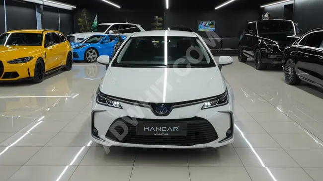 سيارة TOYATA COROLLA 1.8 HYBRİD DREAM E-CVT موديل 2021