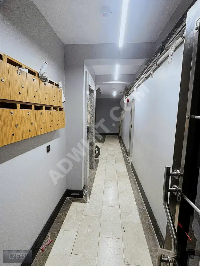 A 2+1 apartment with an area of 90m² on the fifth floor of TAŞTAN EMLAK