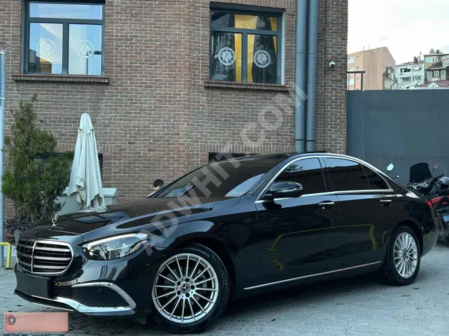 سيارة Mercedes - Benz موديل  2023 بدون  عيوب E200D EXCLUSIVE / ذاكرة مزدوجة - تدفئة / نظام صوتي BURMESTER /ابواب شفط