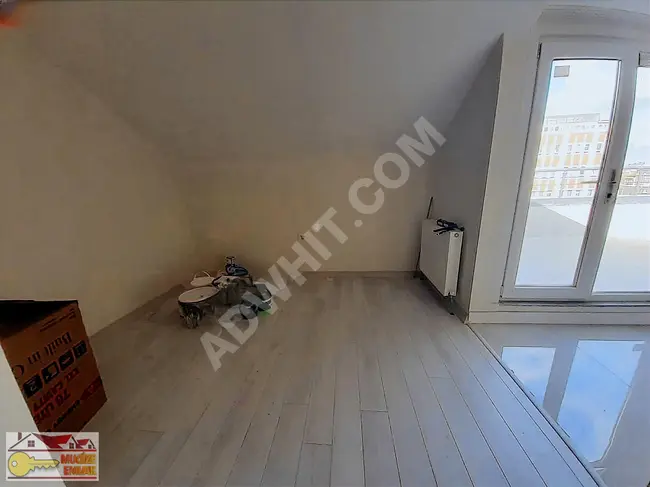 1+1 terrace floor apartment in a new building in HAZNEDAR