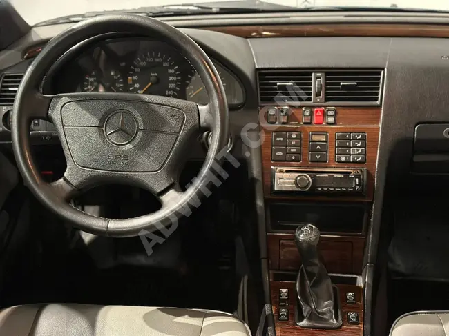 سيارة Mercedes C200 Elegance موديل 1995 ناقل حركة يدوي أوتوماتيك + تكييف هواء