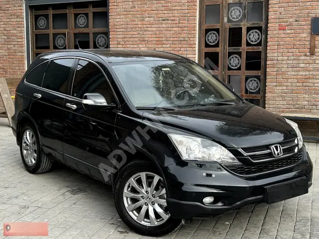 Honda CR-V Executive car model 2010, glass roof, seat heating, lens headlights, and electric seats.